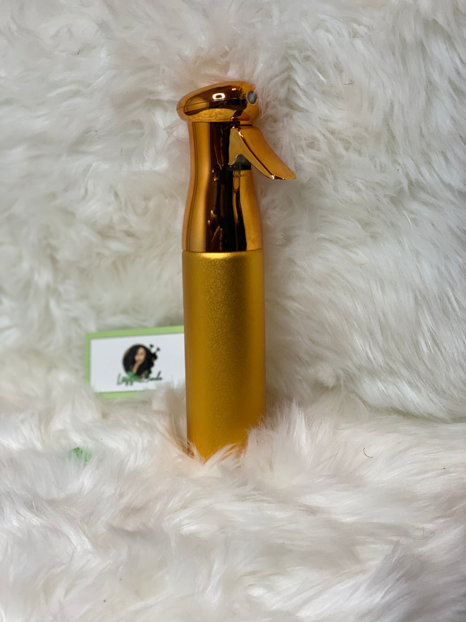 Golden spray bottle